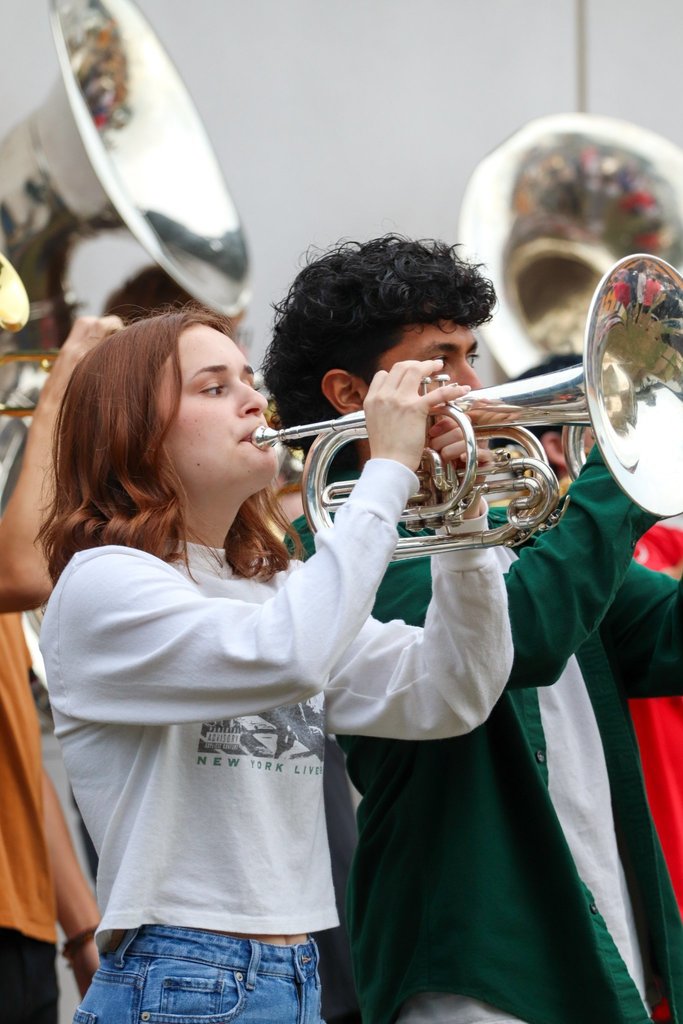 band member playing a brass instrument 